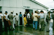 Saipan 1956, No. 0003 Pulling Up Yellow Pants at Saipan Customs and Immigration